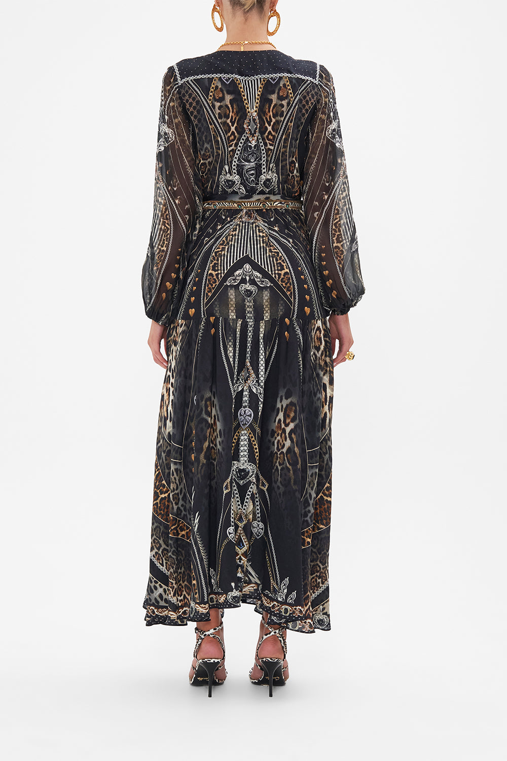 Back view of model wearing CAMILLA silk maxi dress in Chaos In The Cosmos animal print