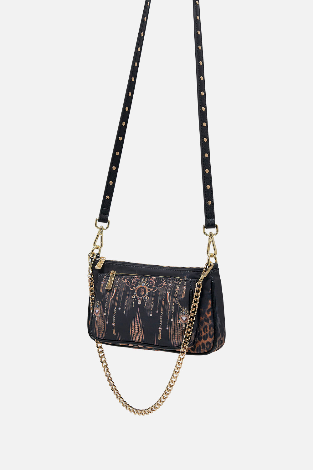 Side view of CAMILLA black nylon bag in Jungle Dreaming animal print