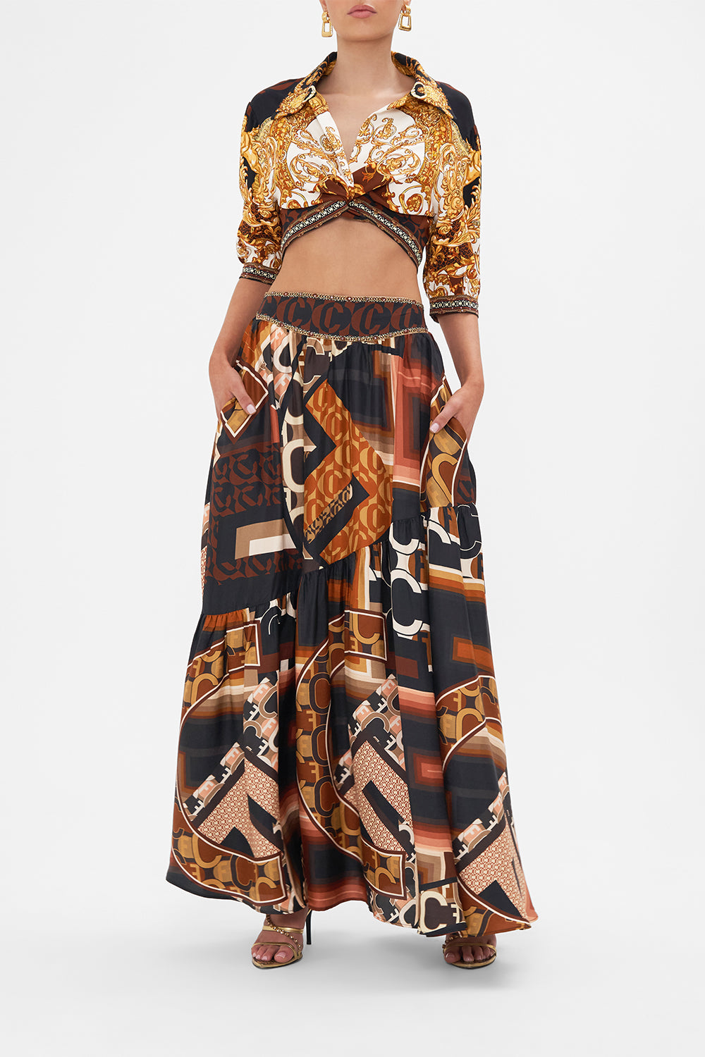Front view of model wearing CAMILLA brown silk maxi skirt in Feeling Fresco print