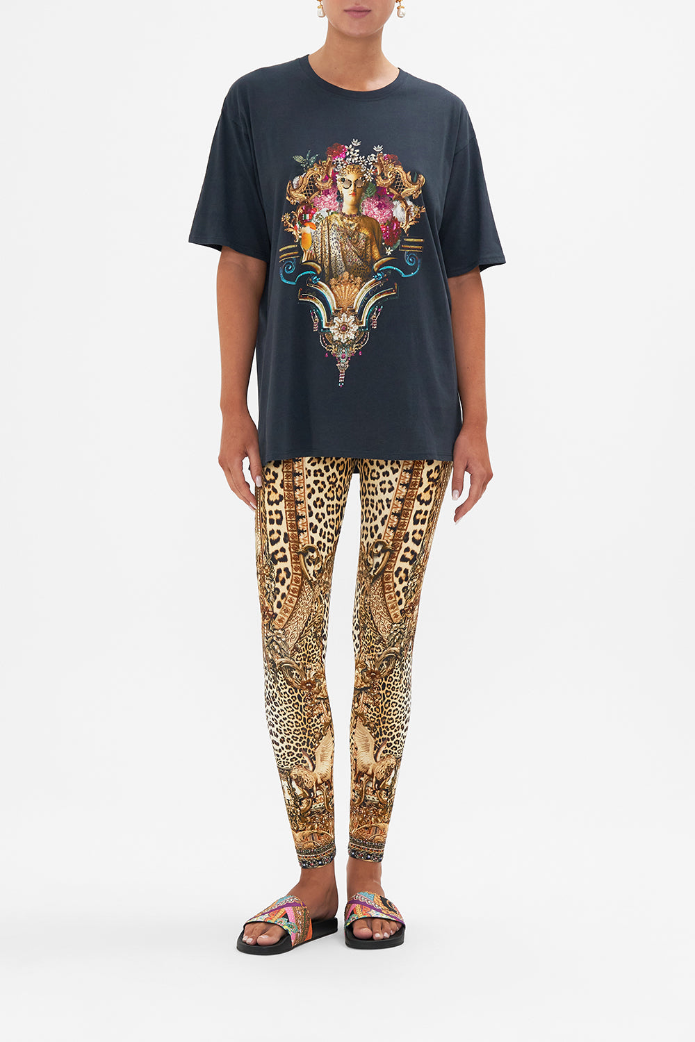 Front view of model wearing CAMILLA leopard print leggings in Standing Ovation print