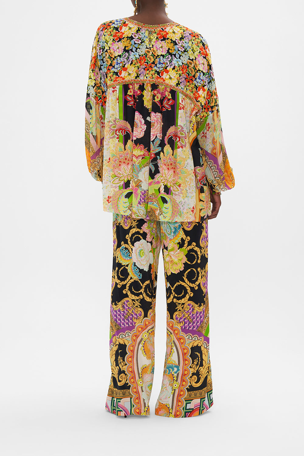 Back view of model wearing CAMILLA silk blouse in Sundowners in Sicily print