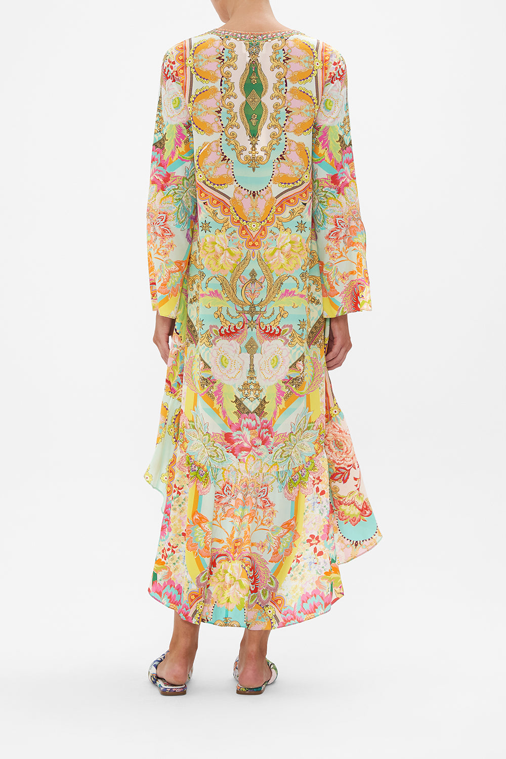 Back view of model wearing CAMILLA silk mini dress with high low hem in An Italian Welcome print