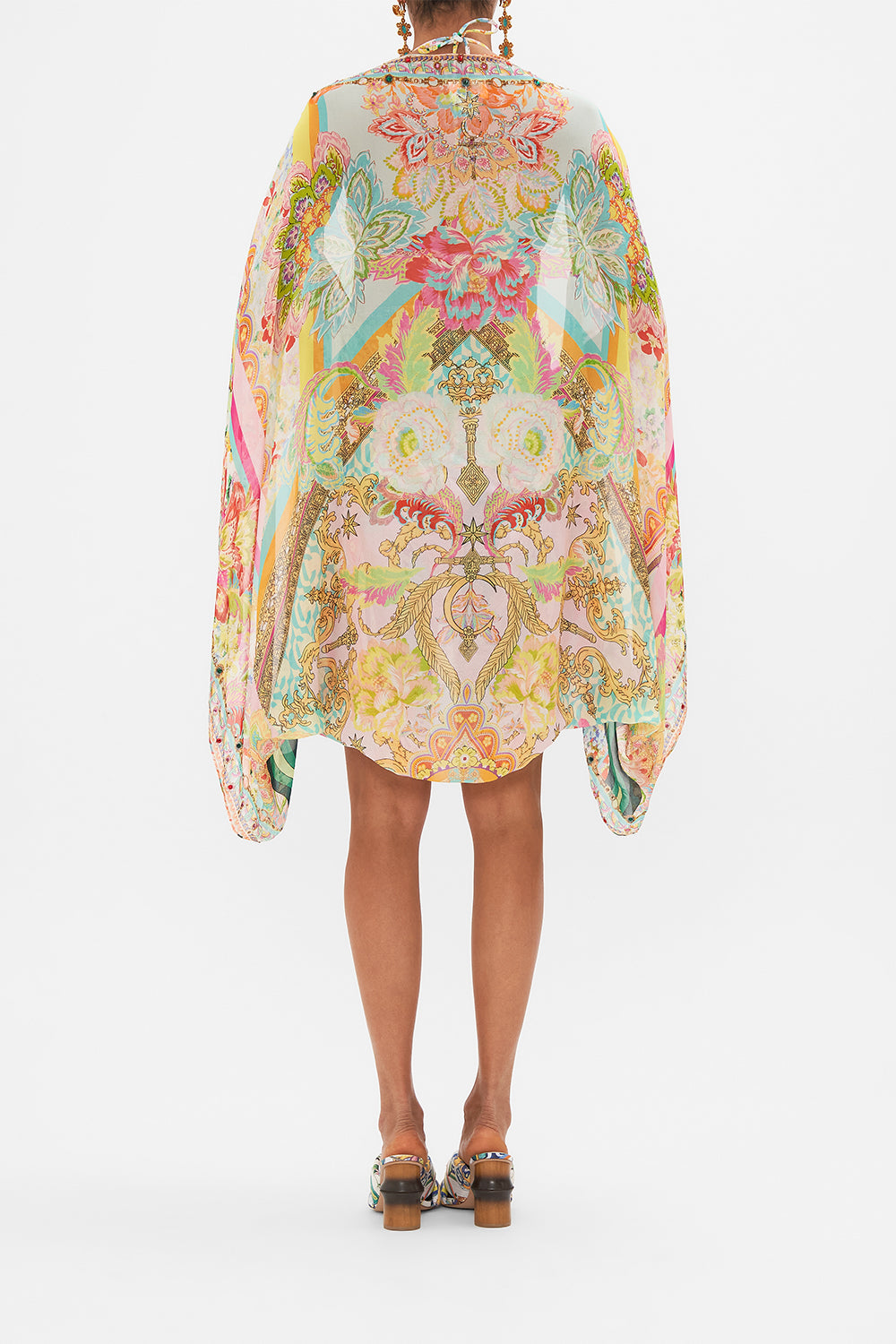 Back view of model wearing CAMILLA silk shrug in An Italian Welcome print