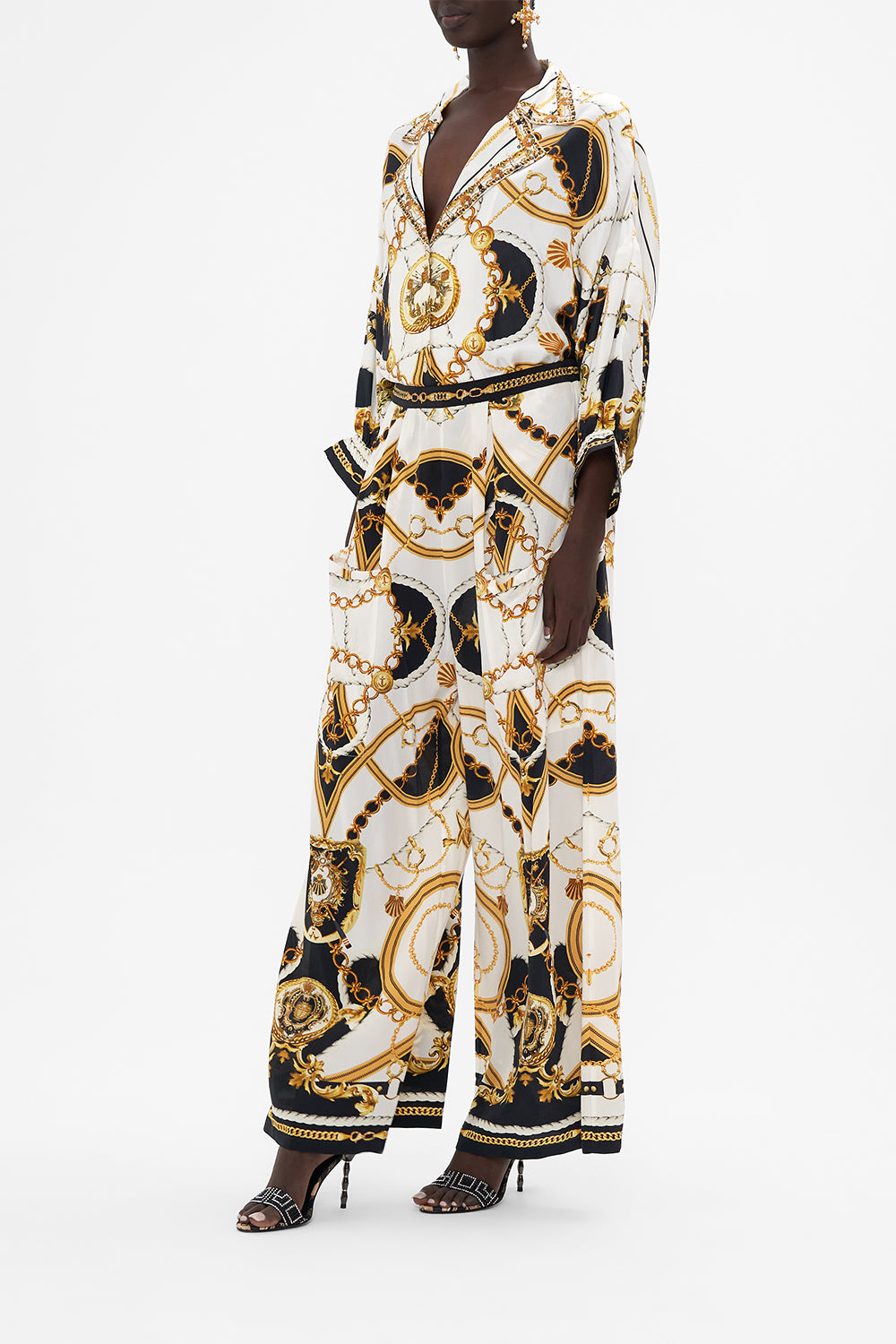 Crop view of model wearing CAMILLA silk shirt in Sea Charm print