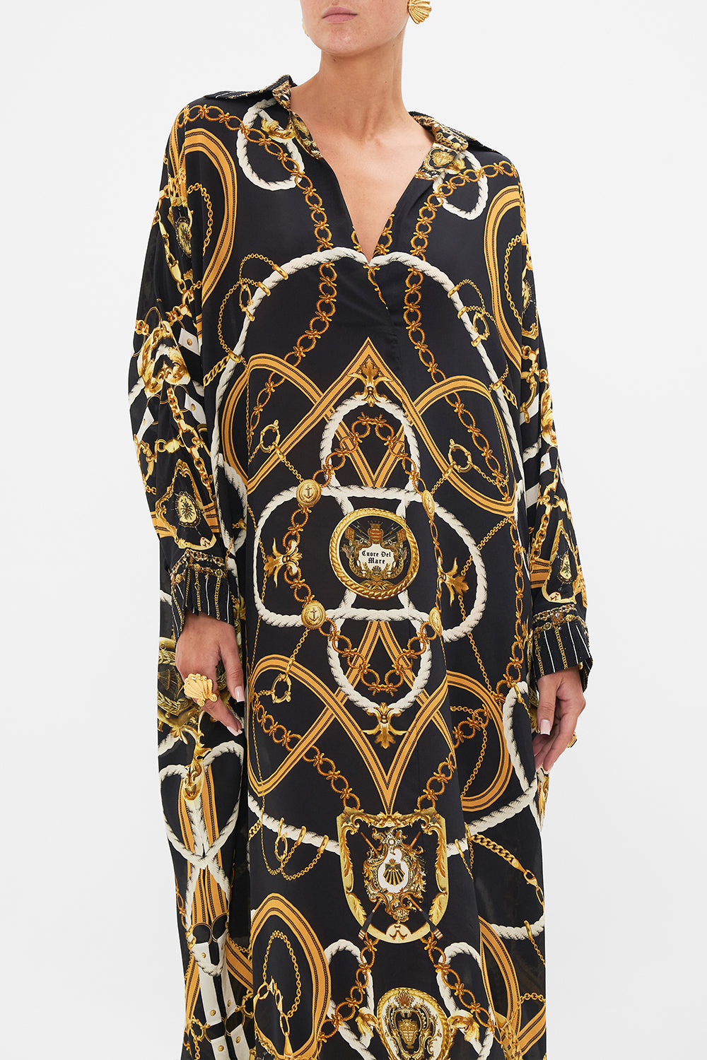 Crop view of model wearing CAMILLA silk kaftan in Coast to Coast print