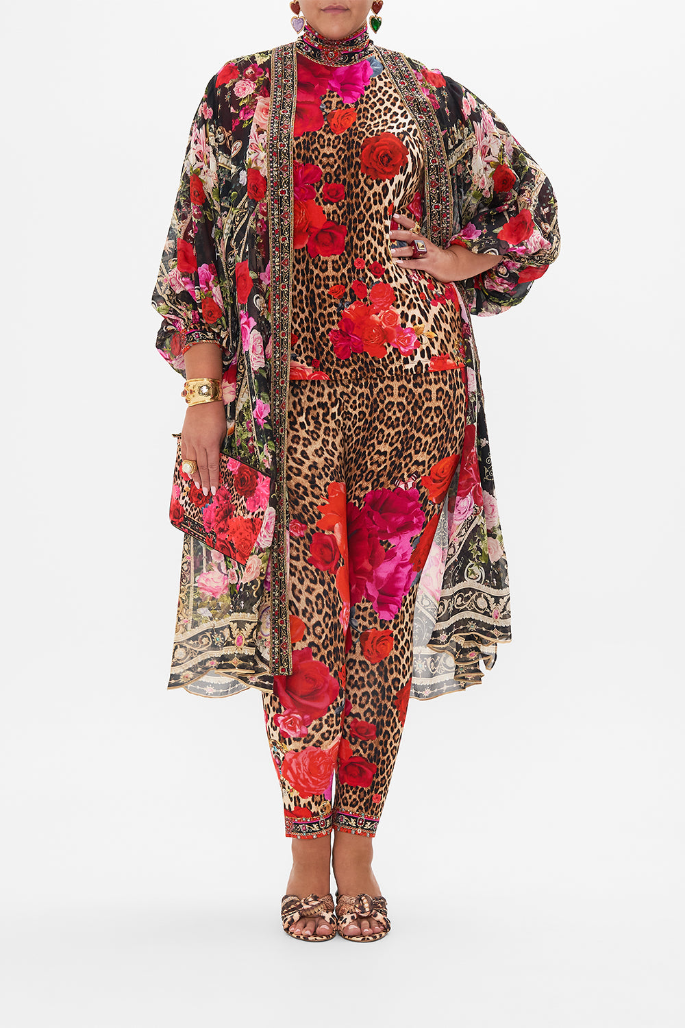 Front view of curvy model wearing CAMILLA plus size leopard print turtleneck top in Heart Like A Wildflower print