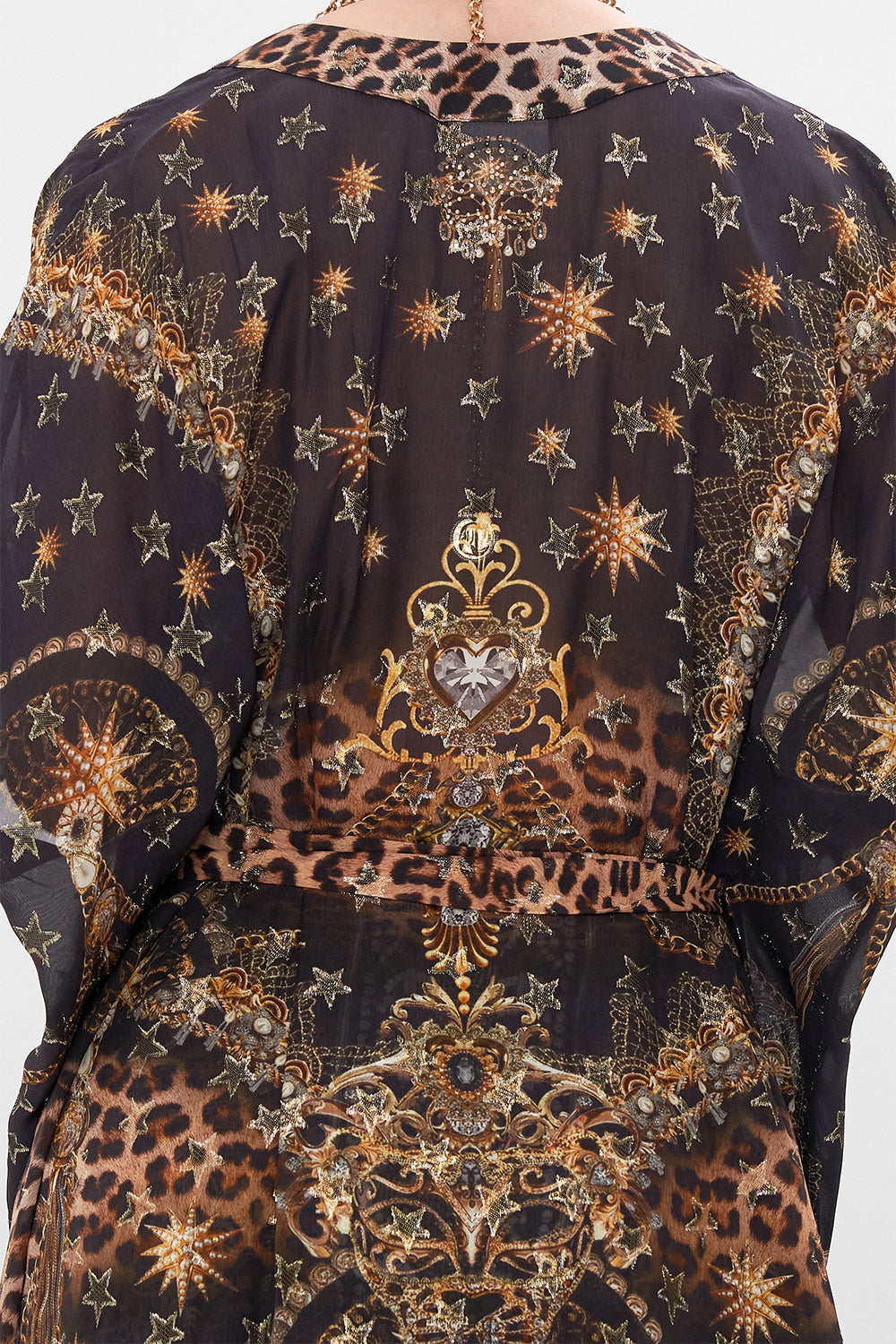 Detail view of model wearing CAMILLA lurex outerwear layer in Masked Moonlight print