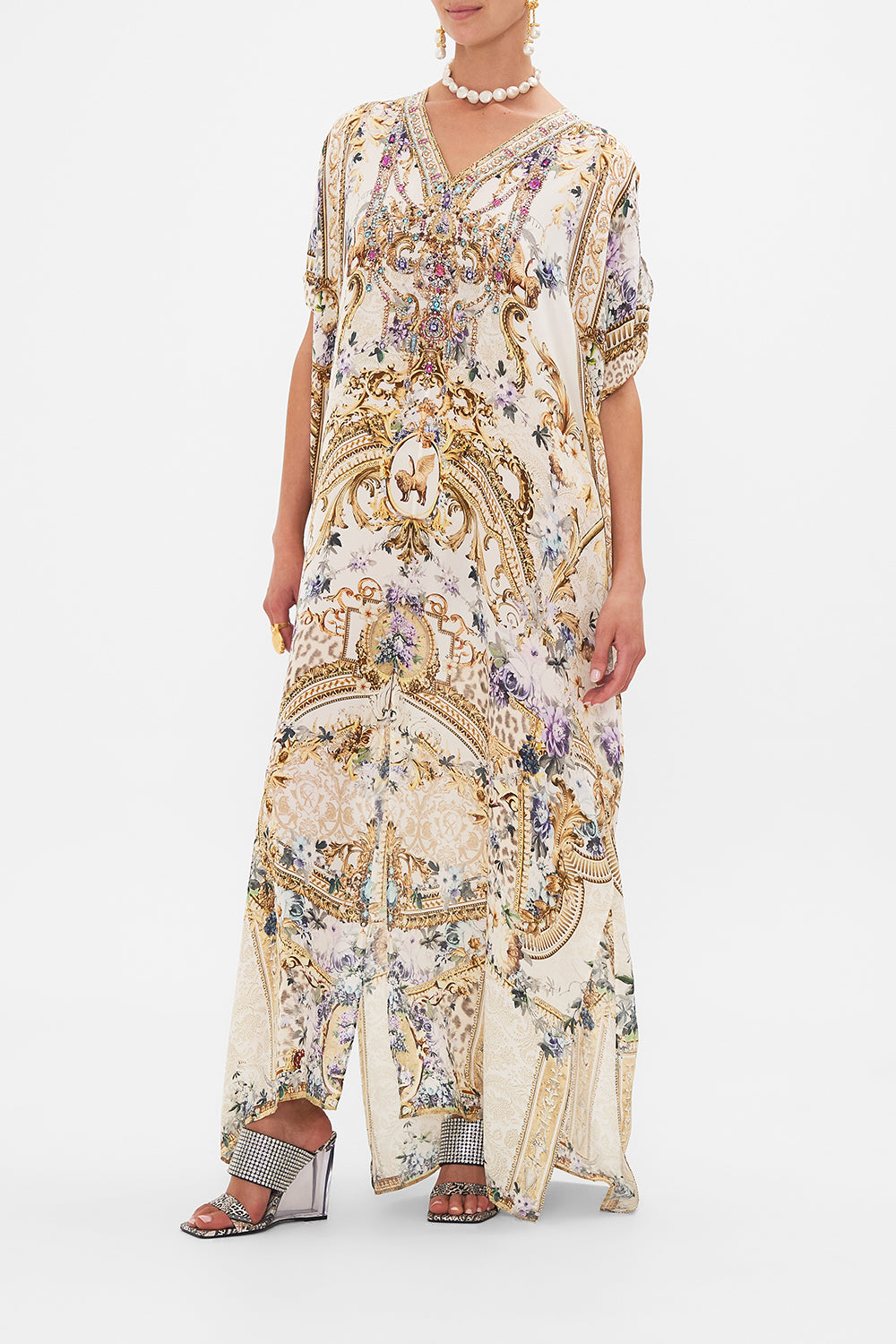 Side view of model wearing CAMILLA resortwear silk kaftan in Palazzo playdate print