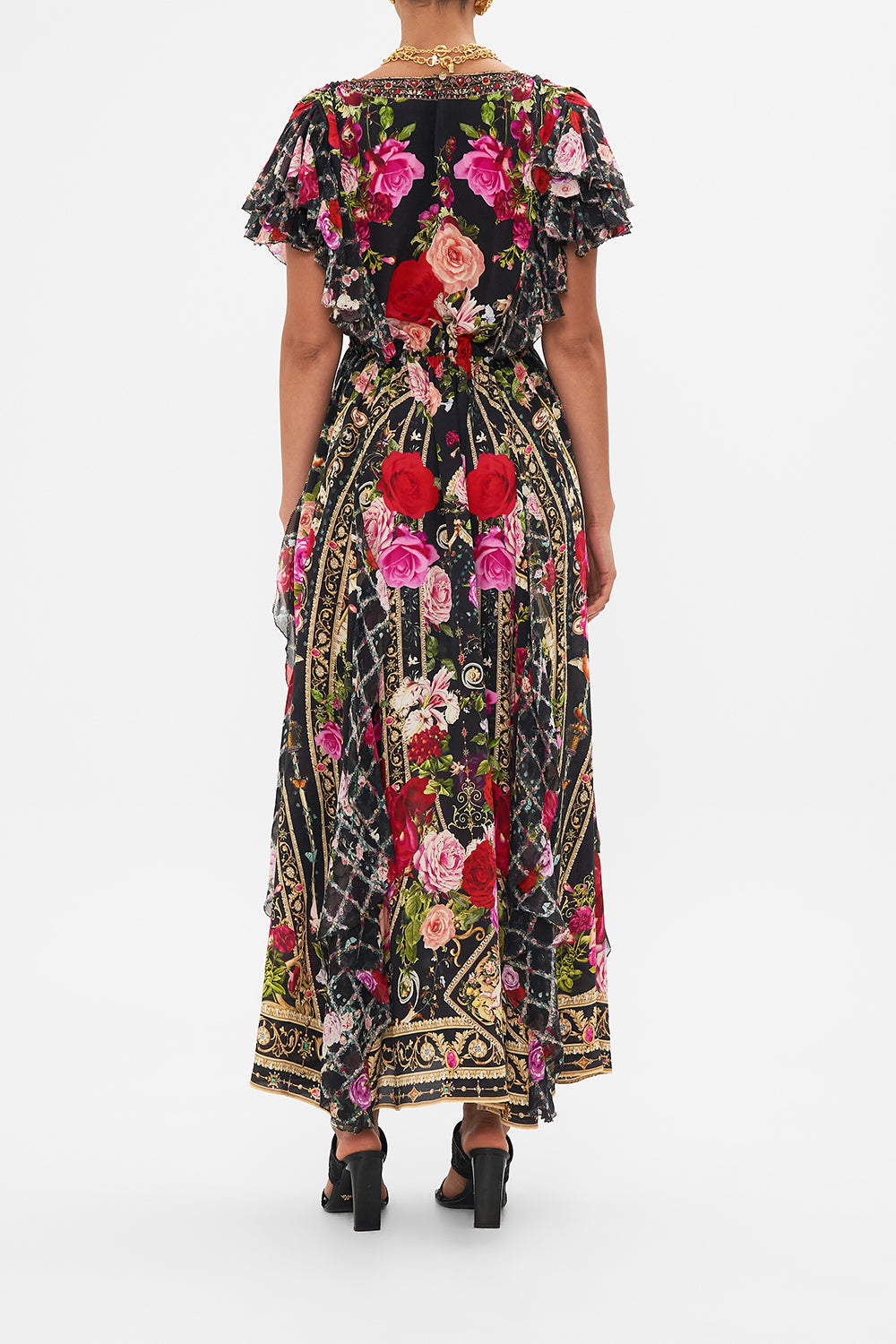 Back view of model wearing CAMILLA designer floral ruffle dress in Reservation For Love print