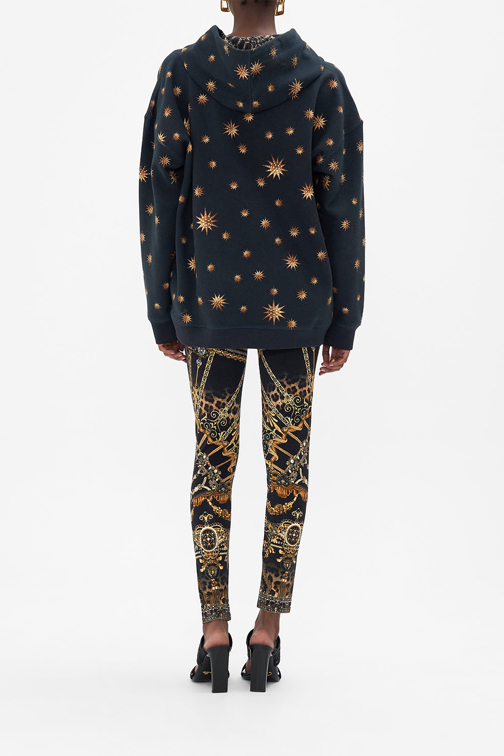 Back view of model wearing CAMILLA luxury hoody in Masked At Moonlight print