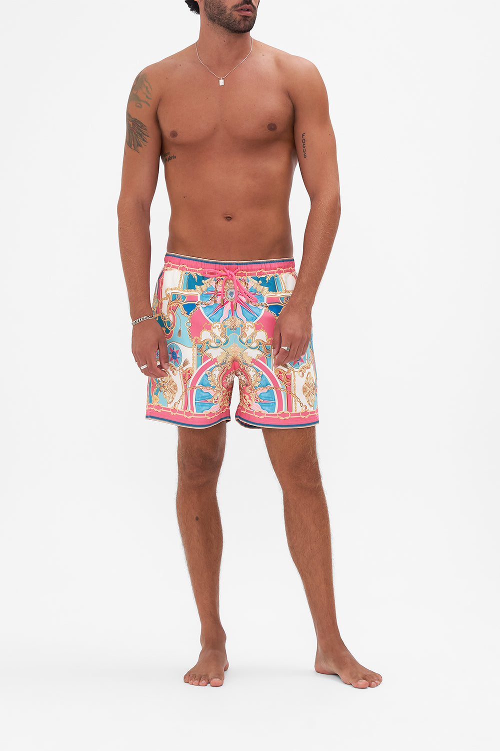 Front view of model wearing Hotel Franks by CAMILLA designer boardshorts in Sail Away With Me print