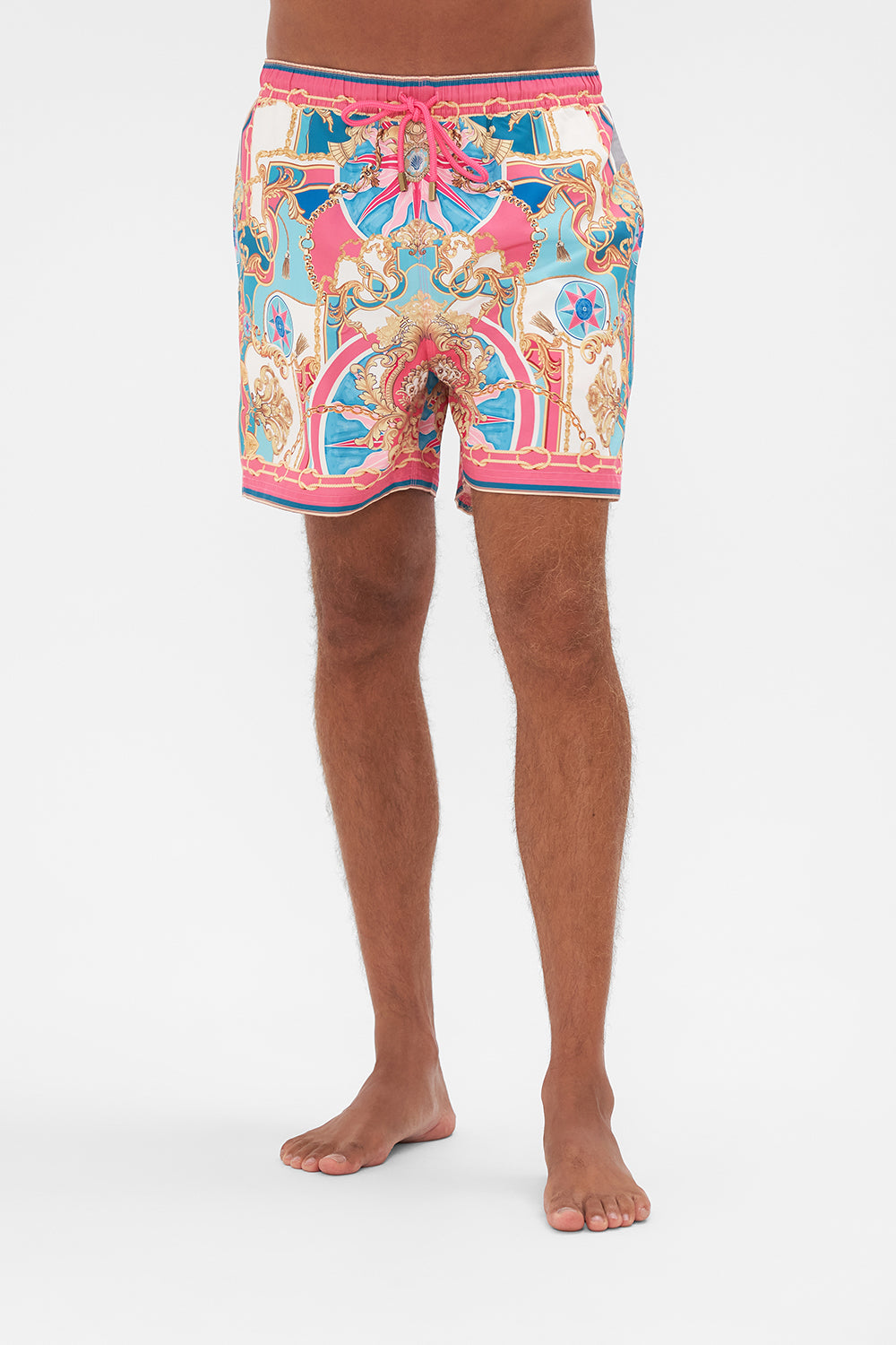 Crop view of model wearing Hotel Franks by CAMILLA designer boardshorts in Sail Away With Me print