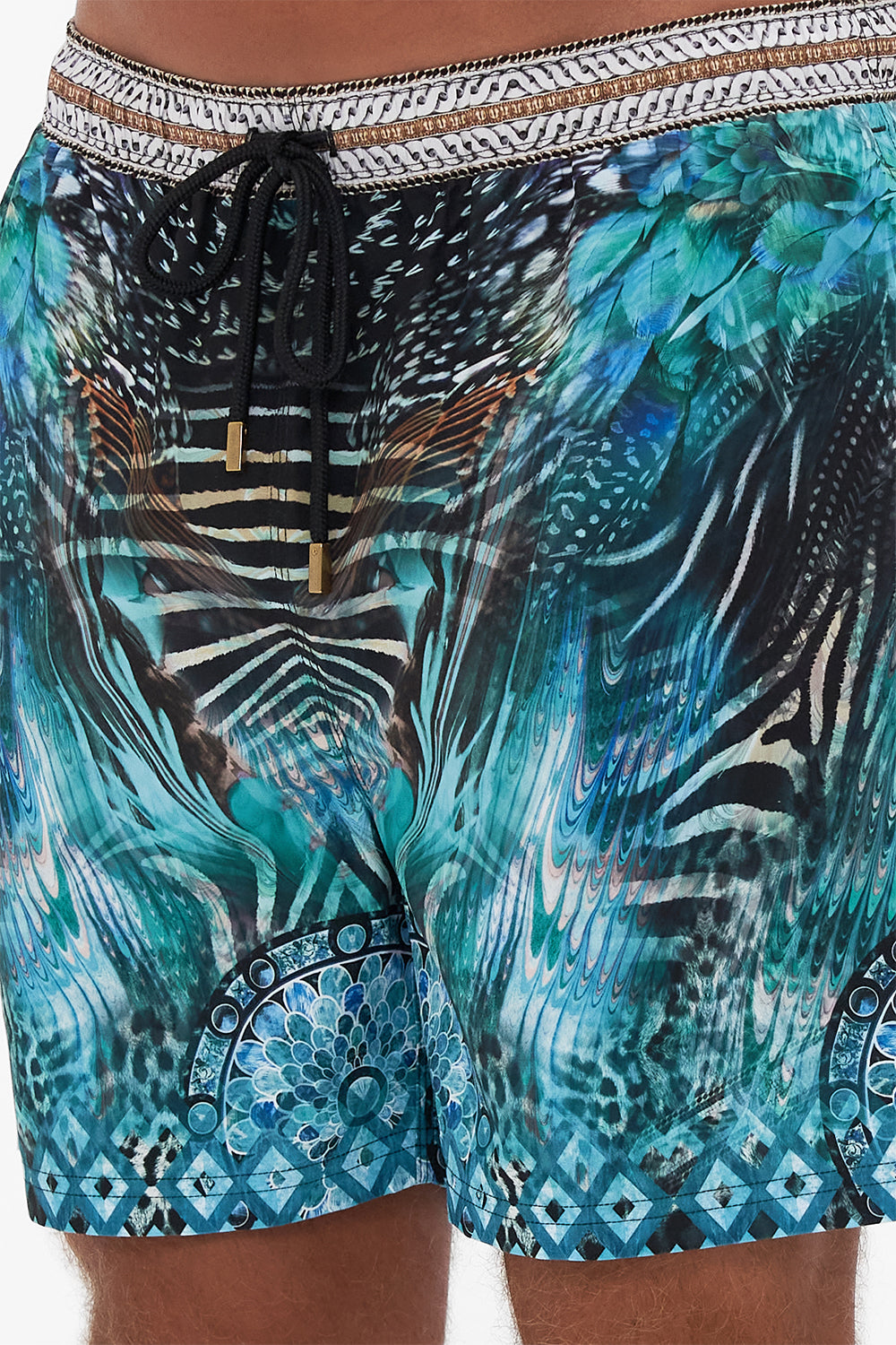 Detail view of model wearing Hotel Franks By CAMILLA luxury mens boardshorts in Azure Allure