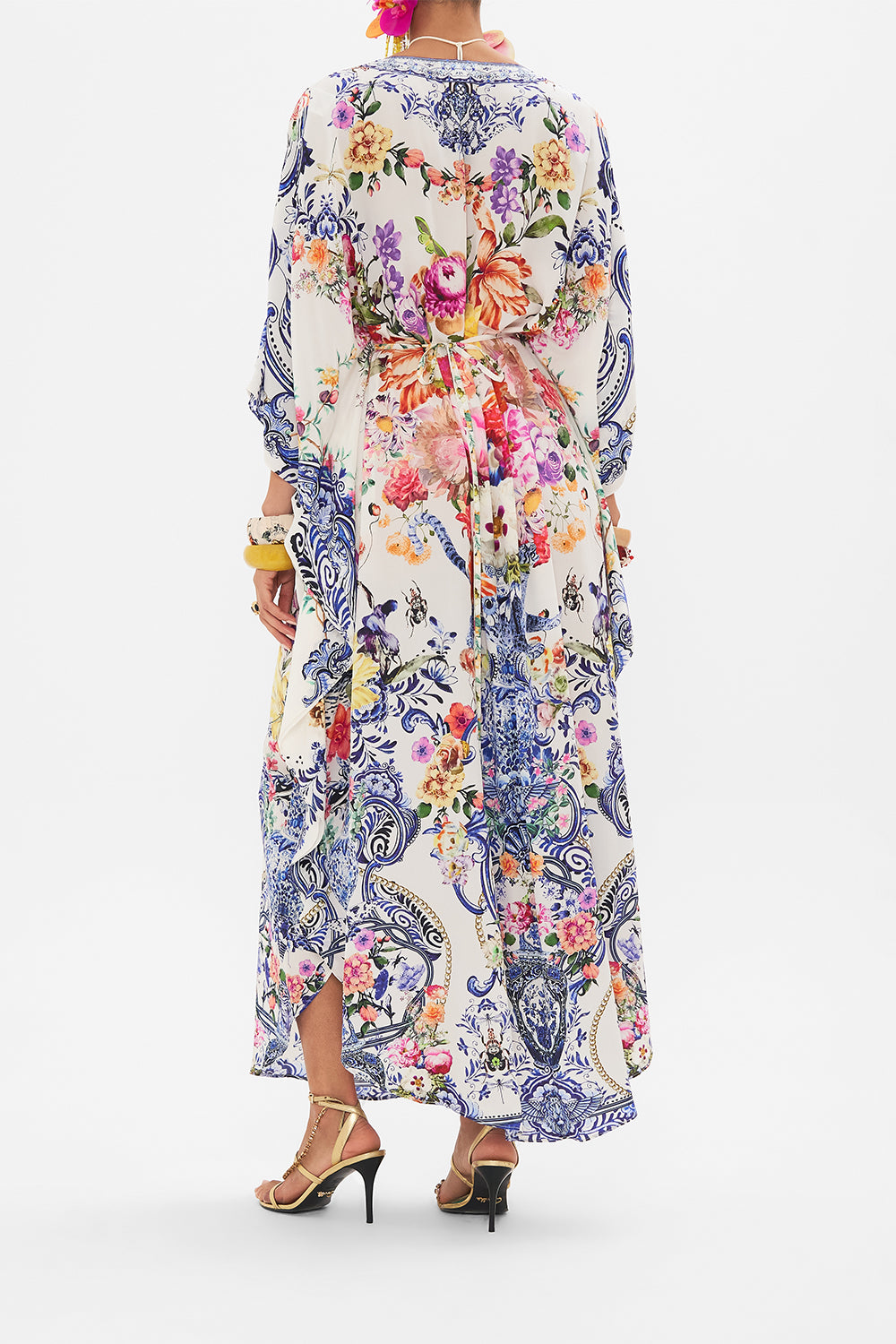 Back view of model wearing CAMILLA silk kaftan in Dutch Is Life print