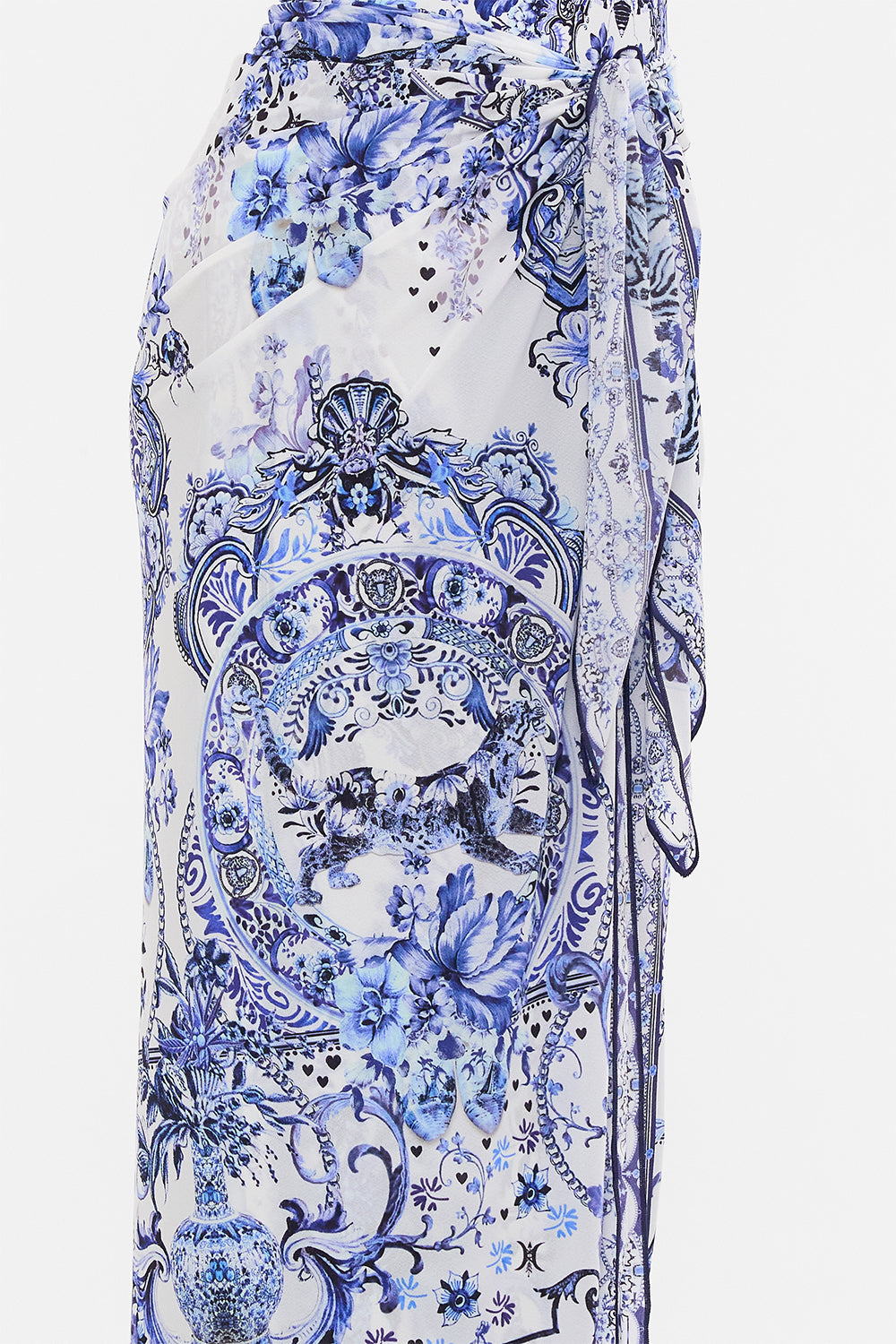 Detail view of model wearing CAMILLA resort wear sarong in Glaze and Graze print