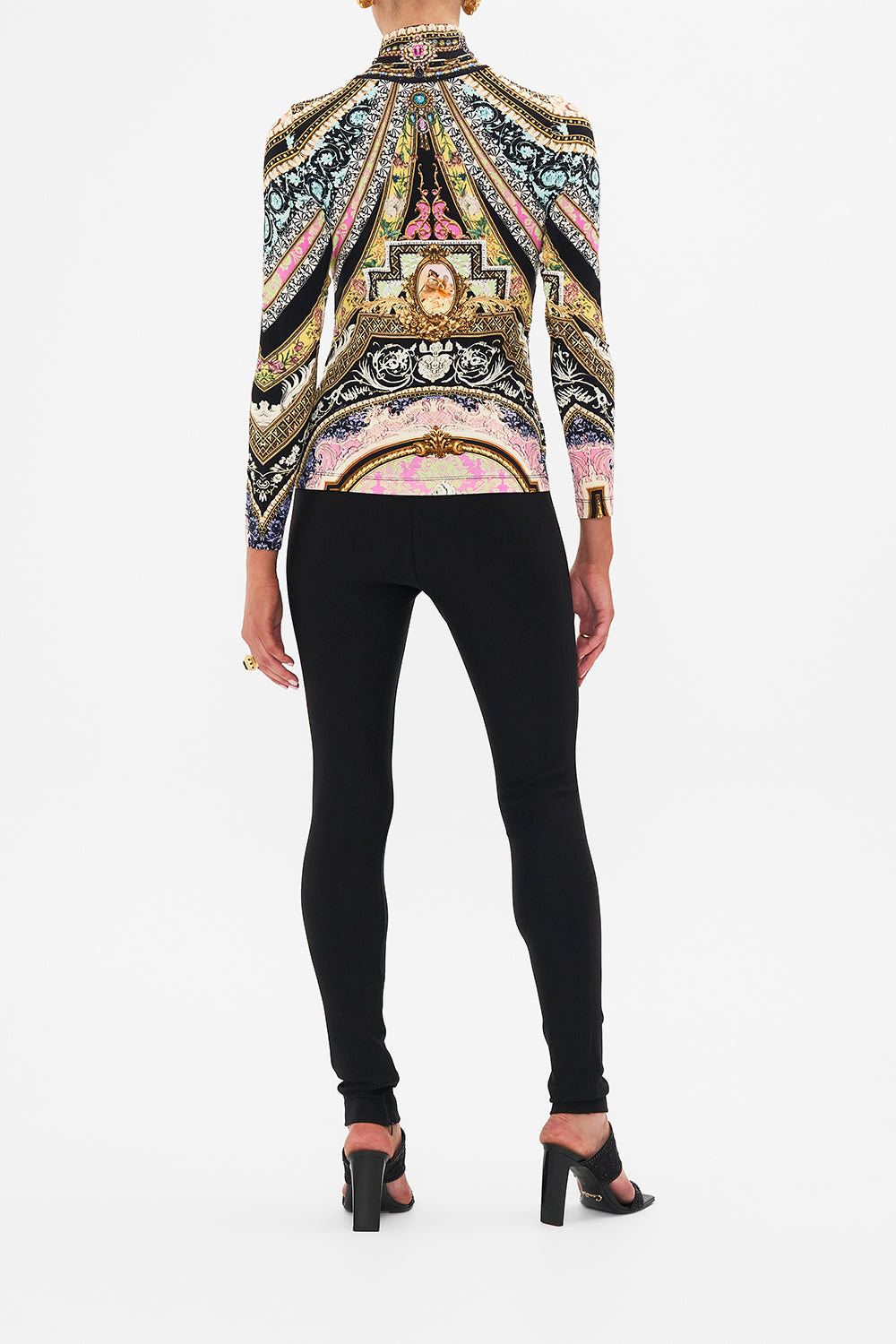 Back view of model wearing CAMILLA jersey turtleneck in Soul Of A Star Gazer print