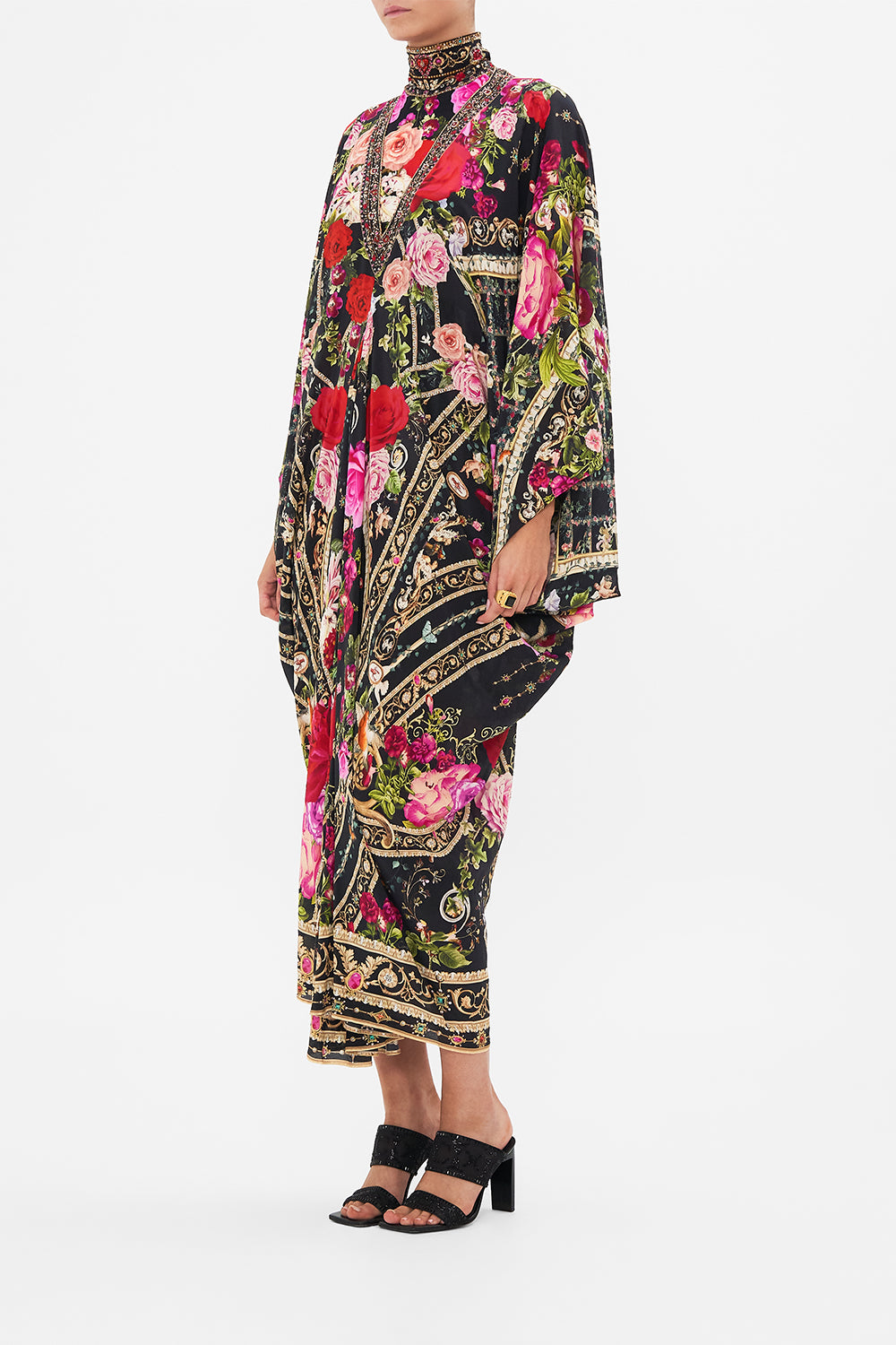 Detail view of model wearing CAMILLA designer resort wear silk kaftan print in Reservation For Love print