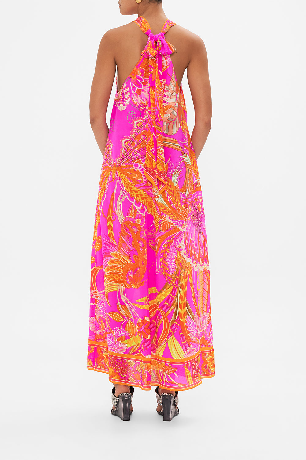 Back view of model wearing CAMILLA silk neck tie dress in A Heart That Flutters print