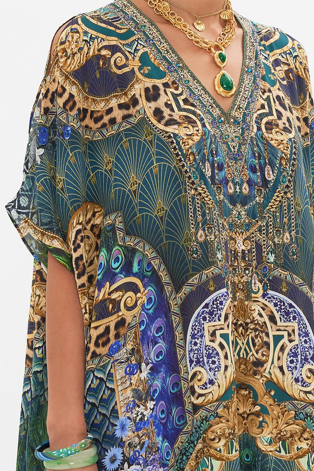 Detail view of model wearing CAMILLA silk kaftan in Fan Dance print