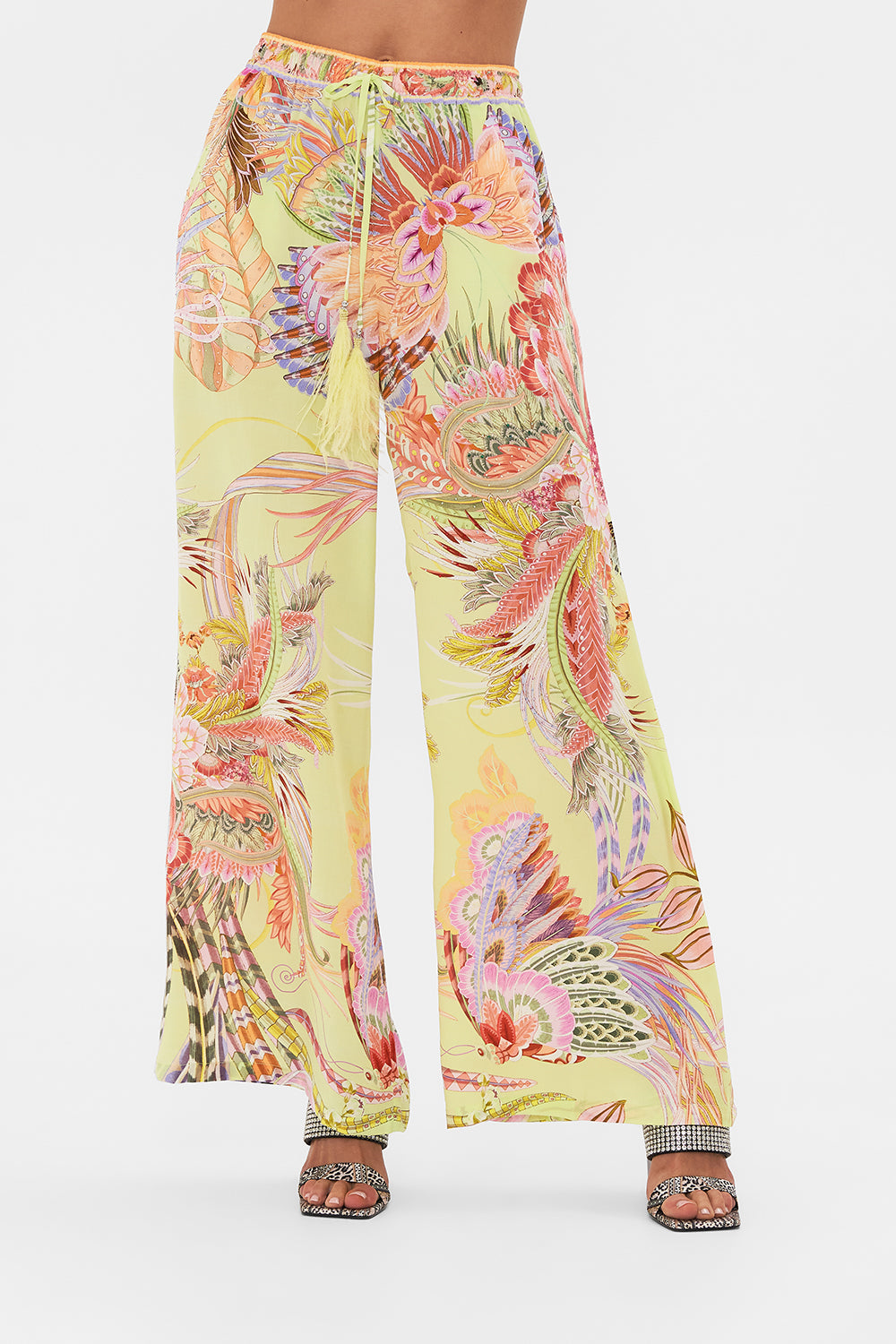 Detail view of model wearing CAMILLA silk pants Cosmic Tuscan print