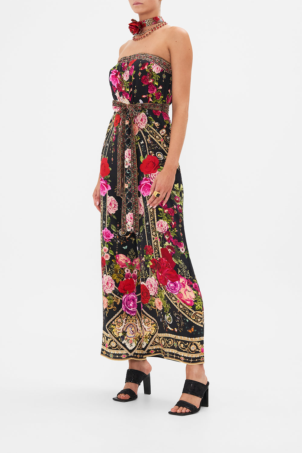 Side view of model wearing CAMILLA floral silk jumpsuit in Reservation For Love print
