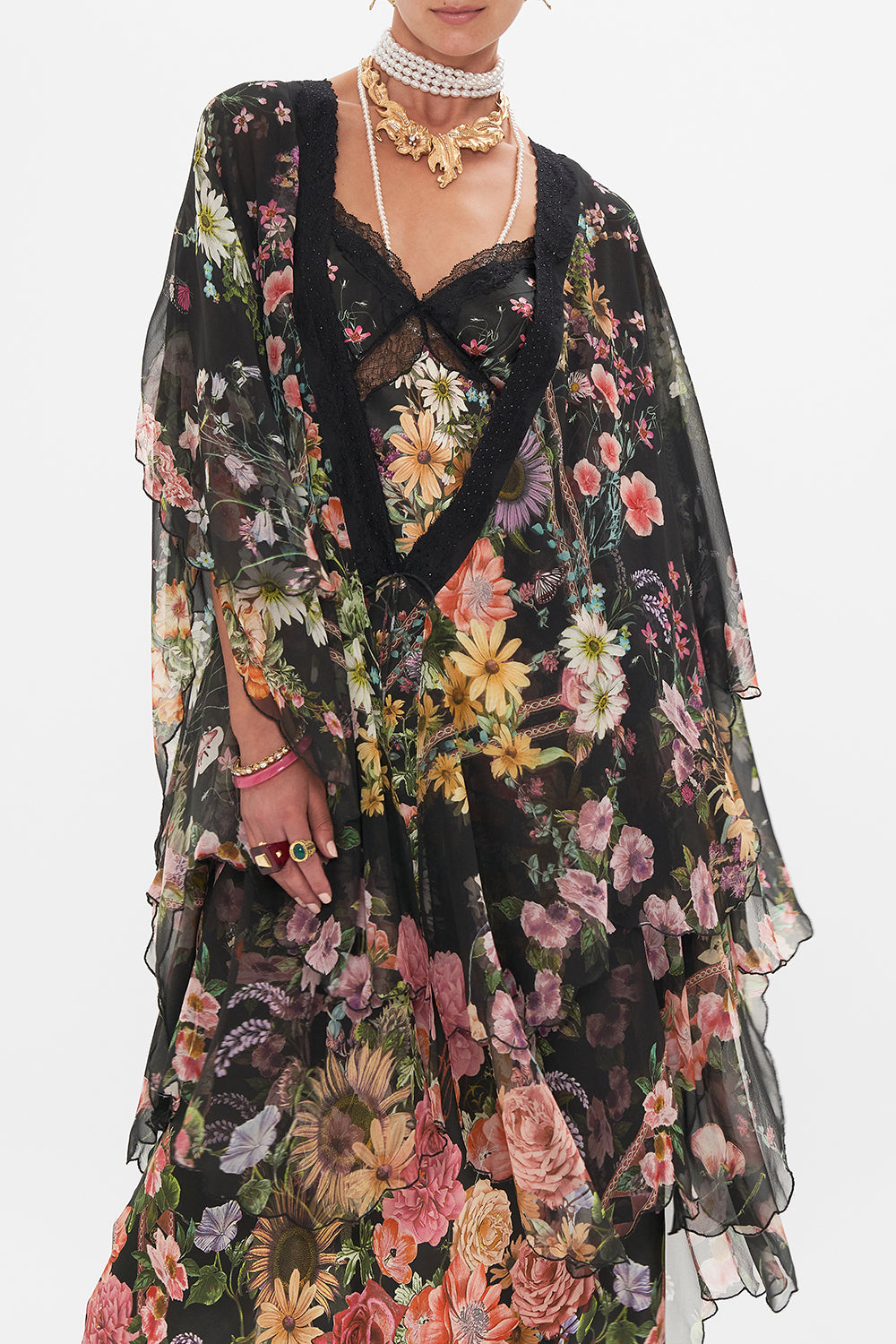 Crop view of model wearing CAMILLA silk layer in Letters From A Vineyard print