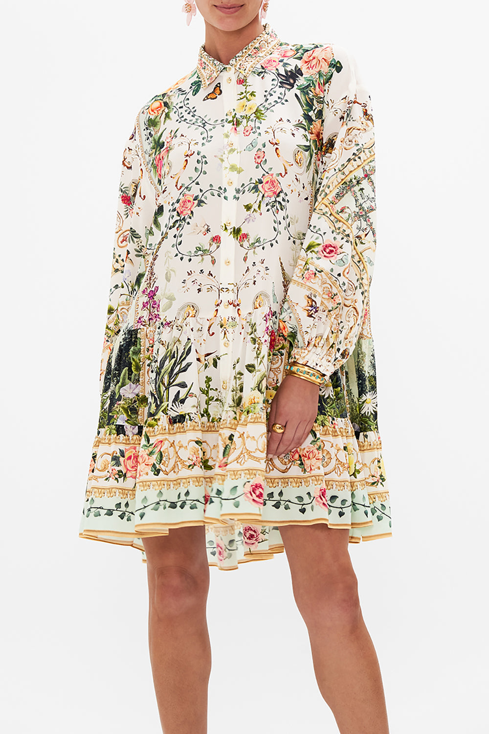 Crop view of model wearing CAMILLA silk shirt dress in Renaissance Romance print