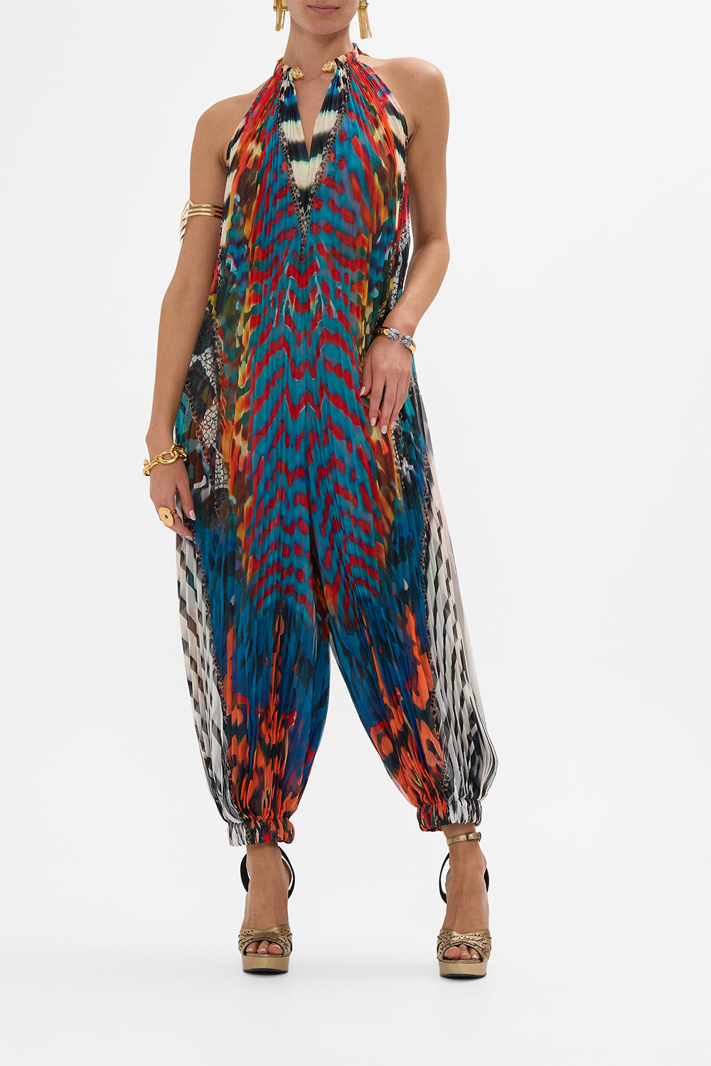 CAMILLA plisse jupsuit with neckpiece in Desert Visions print.