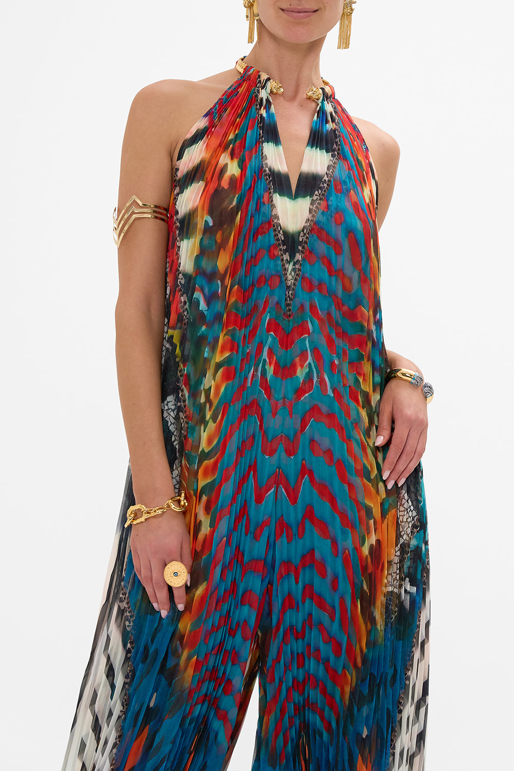 CAMILLA plisse jupsuit with neckpiece in Desert Visions print.