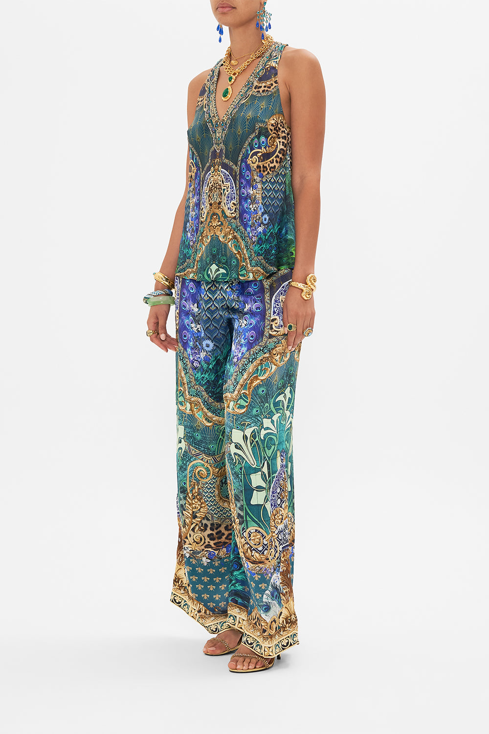 Side view of model wearing CAMILLA silk top in Fan Dance print