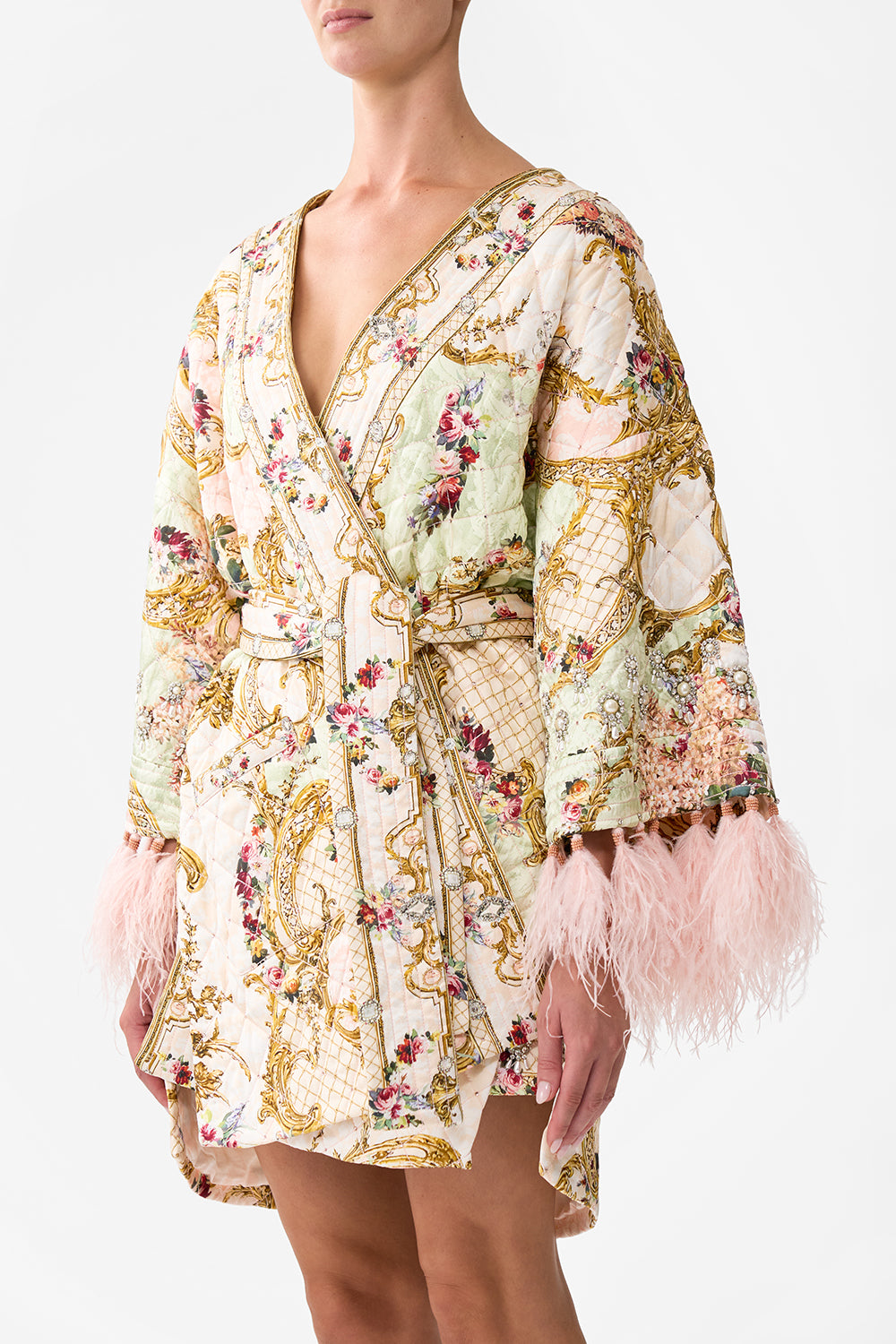 LAYER WITH TIE BELT AND FEATHERS THE QUEENS QUARTERS