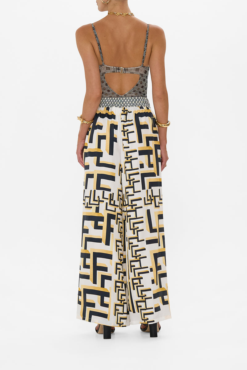 PANT WITH CUT OUT AND TRIM TEMPLES OF DENDARA