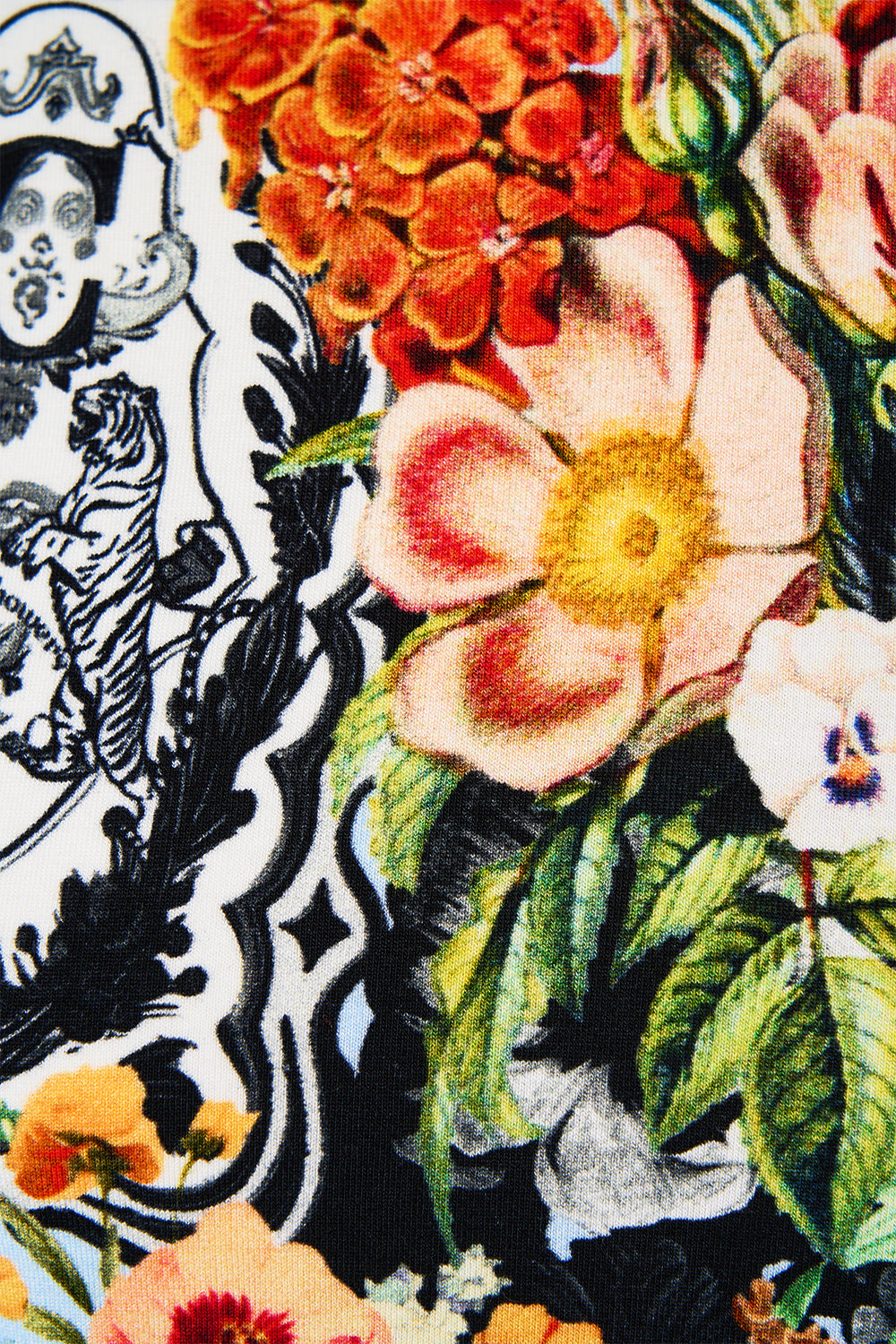 The CAMILLA Cropped Jersey Turtleneck in our Flower Showers print.