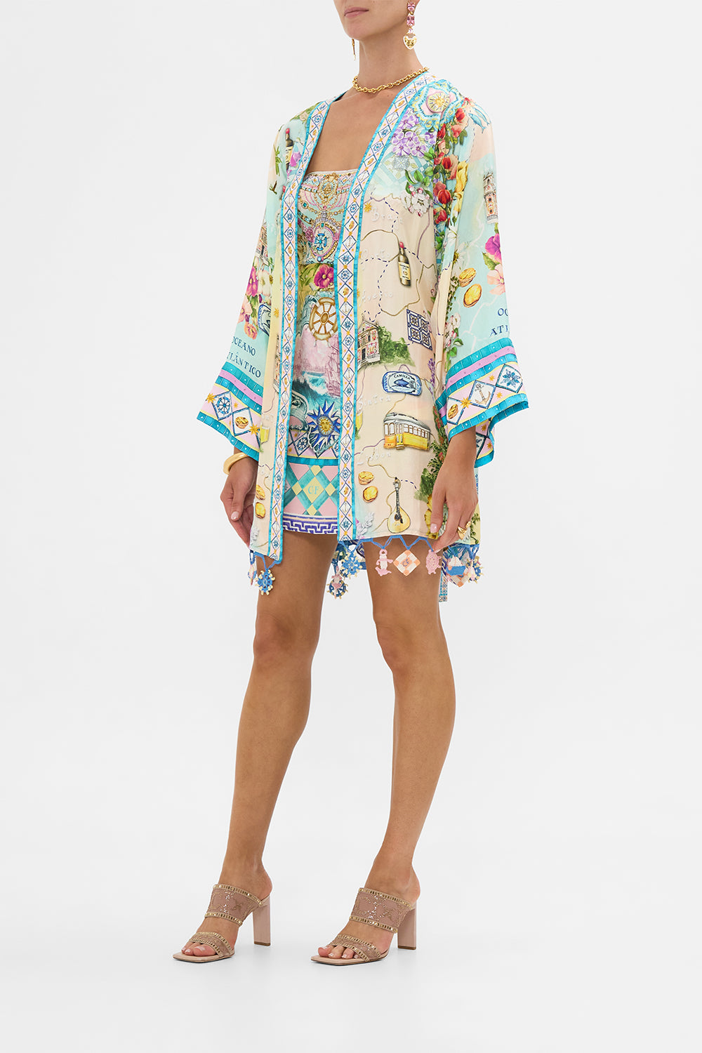 The CAMILLA Short Kimono Wrap in our Just Coasting print.