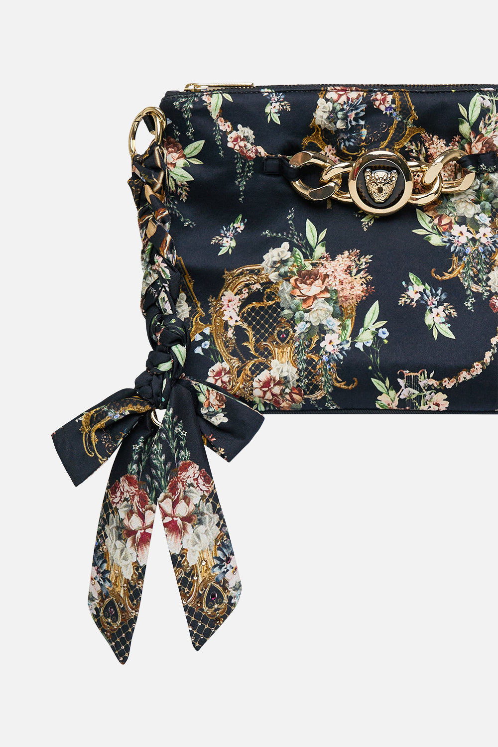 The CAMILLA Braided Strap Clutch in our Noble Endeavours print.