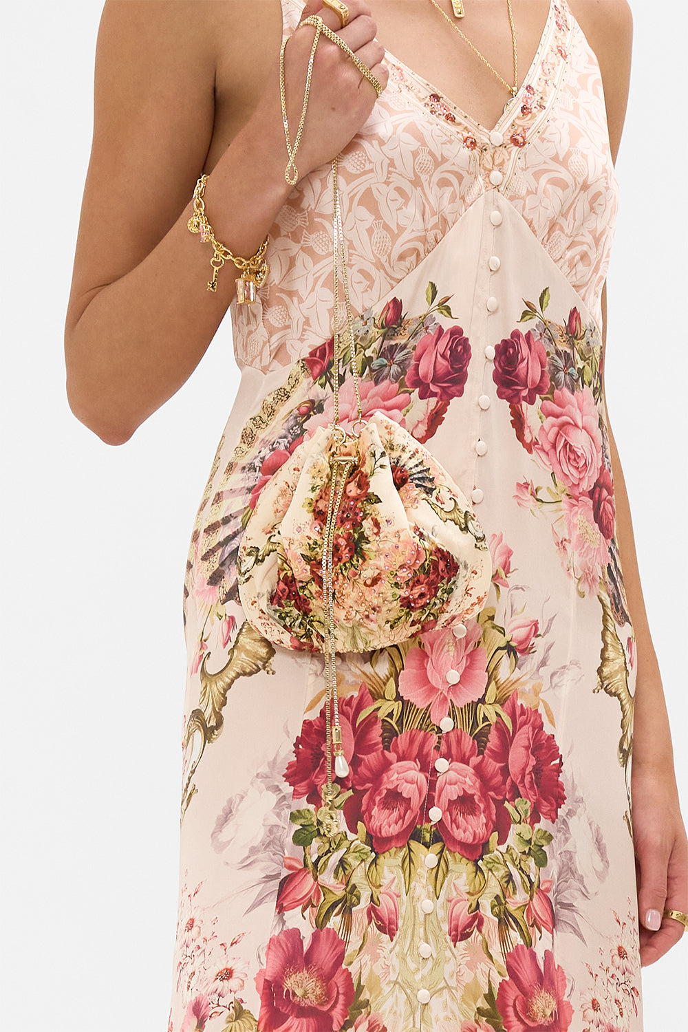 The CAMILLA Drawstring Pouch Bag With Chain Strap in our Meet Me At The Majestic print.