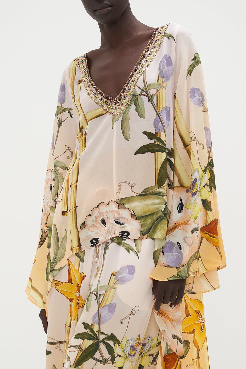 HIGH LOW FLARED BLOUSE ORIGINAL SIN