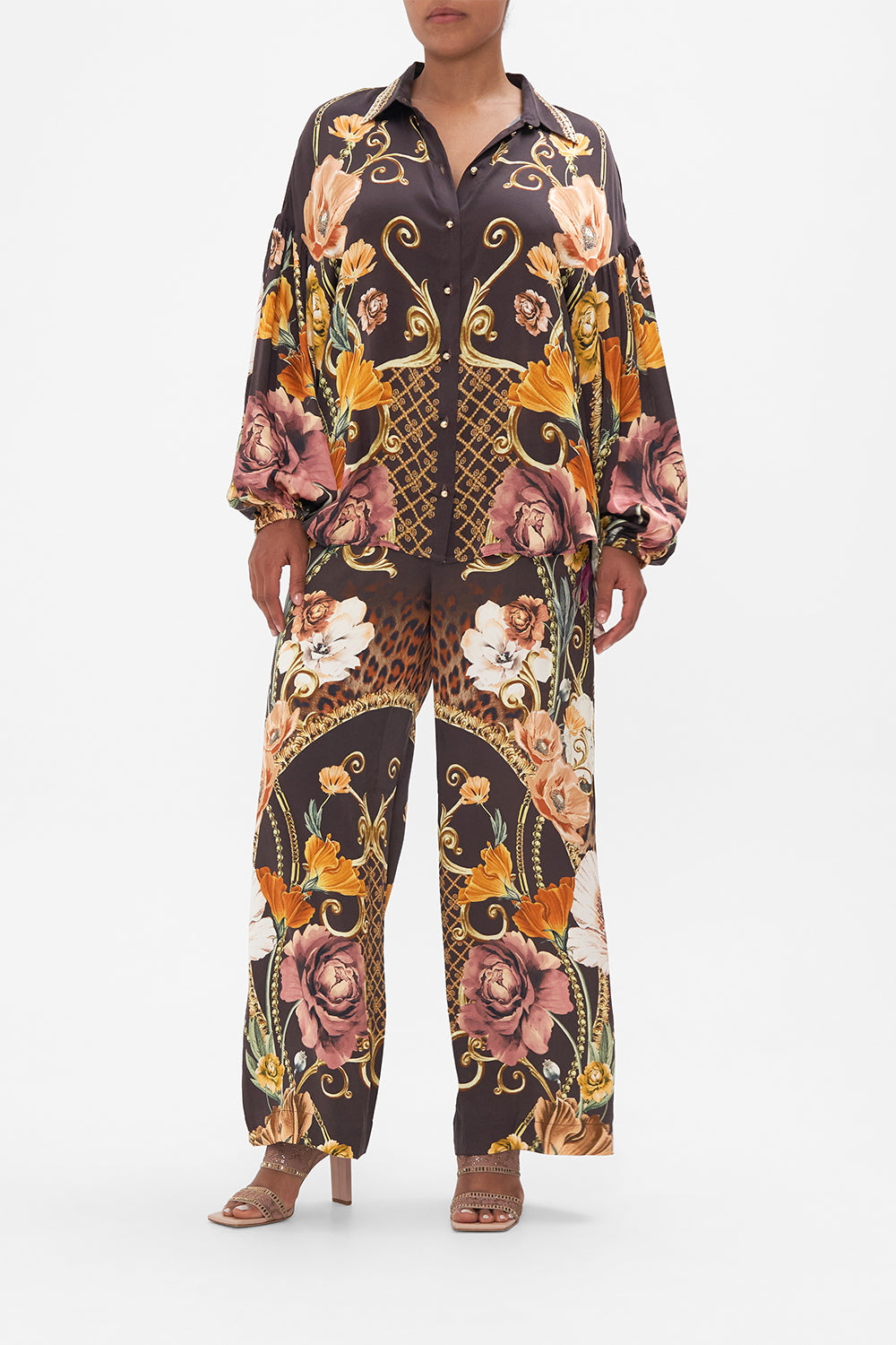 Front view of model wearing CAMILLA brown floral silk blouse in Wave Your Wand print