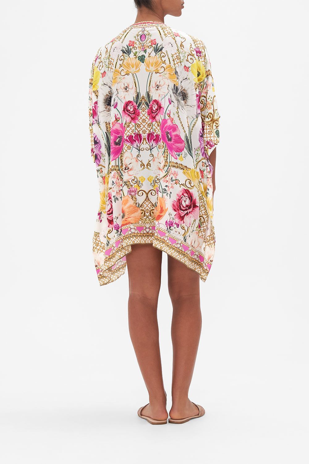 Back view of model wearing CAMILLA silk kaftan in floral in Destiny Calling print