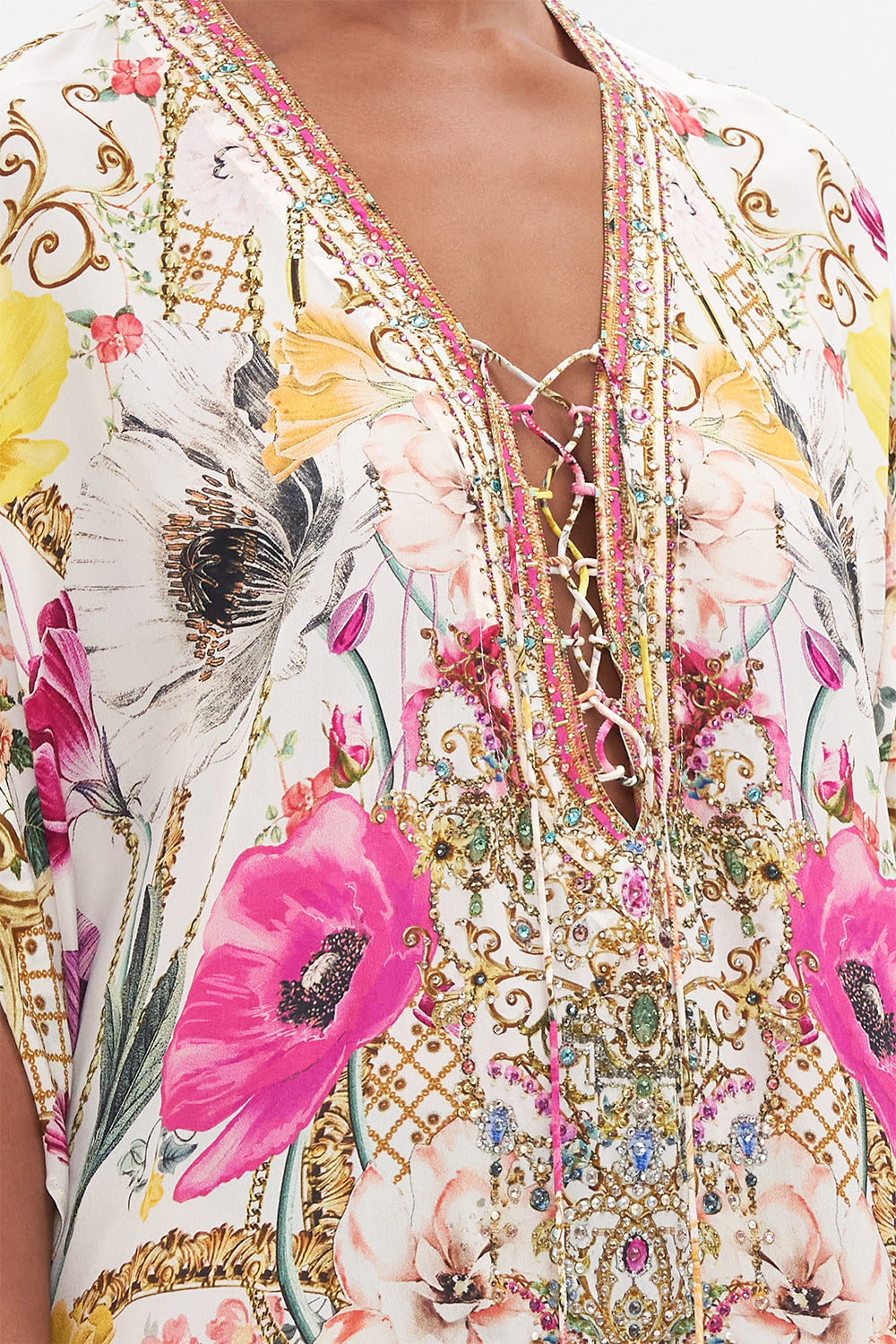 Detail view of model wearing CAMILLA silk kaftan in floral in Destiny Calling print