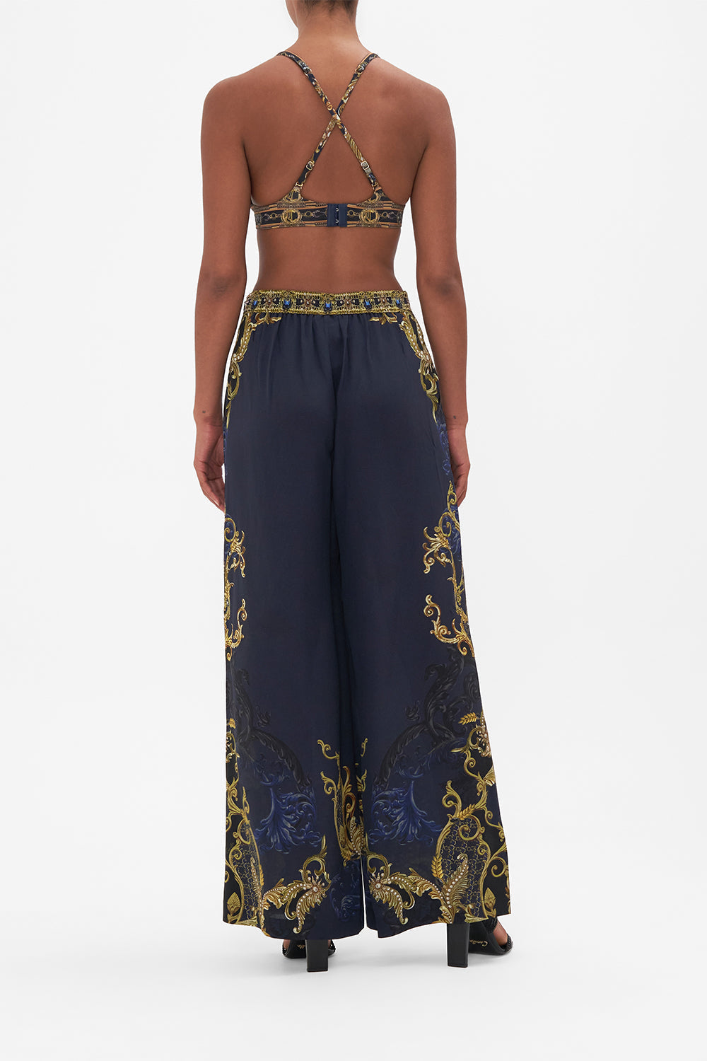 Back view of model wearing CAMILLA soft cup bra in Moonlight Melodies print