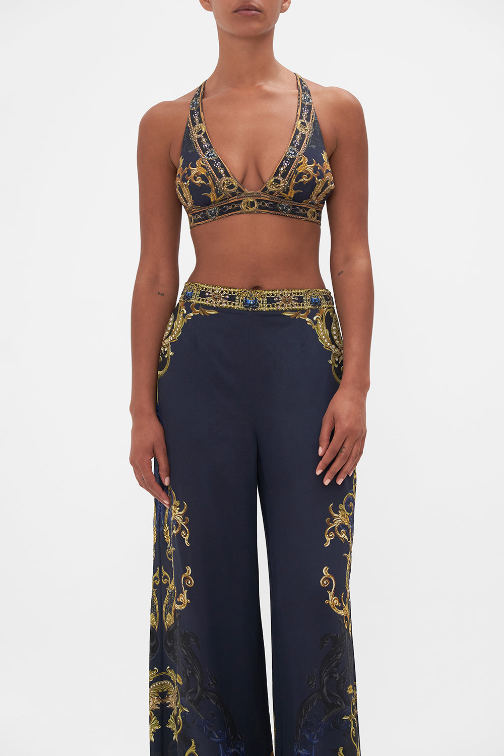 Crop view of model wearing CAMILLA soft cup bra in Moonlight Melodies print