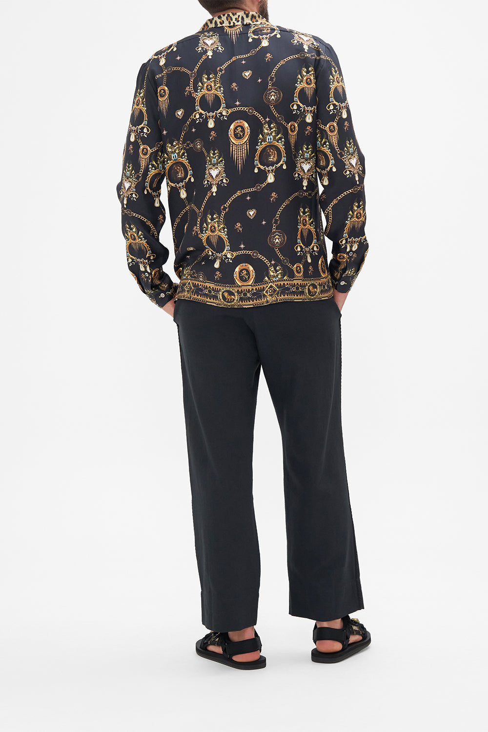 Back view of model wearing Hotel Franks by CAMILLA mens black long sleeve silk shirt in Jungle Dreaming print
