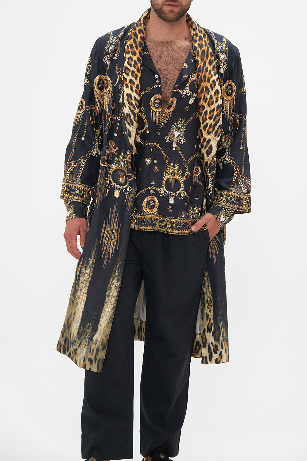 Crop view of model wearing Hotel Franks by CAMILLA mens black silk robe in Jungle Dreaming print