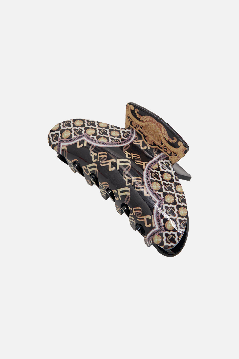 Close up view of CAMILLA printed hair clasp in Tether Me Not print