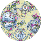 Decorative plate with floral and architectural design on a yellow background