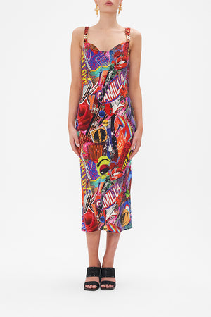Front view of model wearing CAMILLA bias silk slip dress in multicoloured Radical Rebirth print