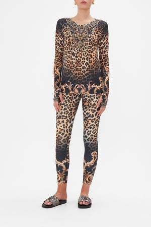 Front view of model wearing CAMILLA leopard print long sleeve top in Running In The Wild print