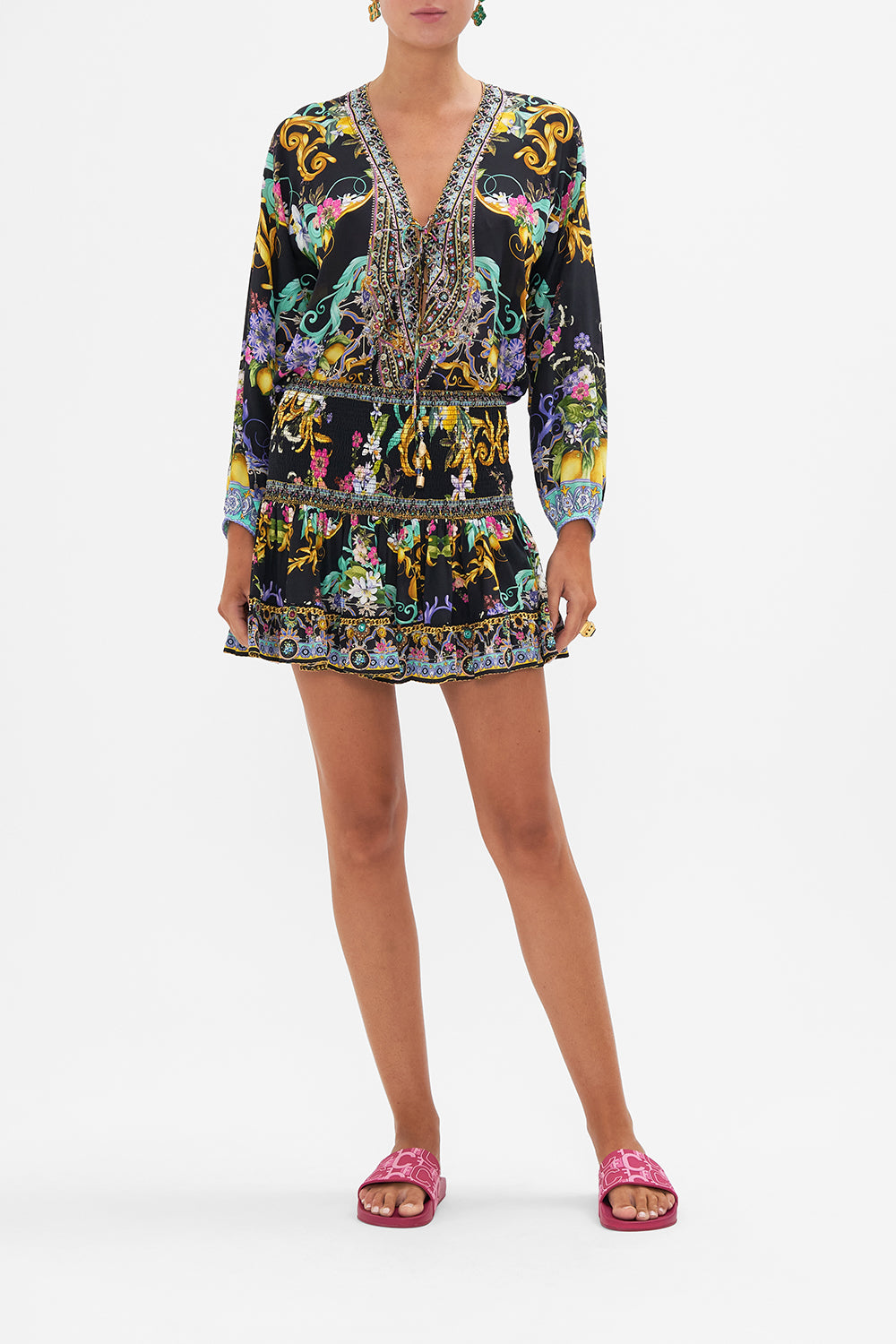 Front view of model wearing CAMILLA silk floral mini skirt in Meet Me In Marchesa print