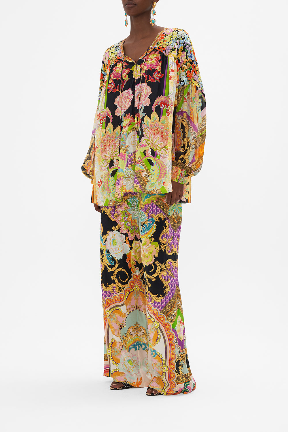Side view of model wearing CAMILLA silk blouse in Sundowners in Sicily print